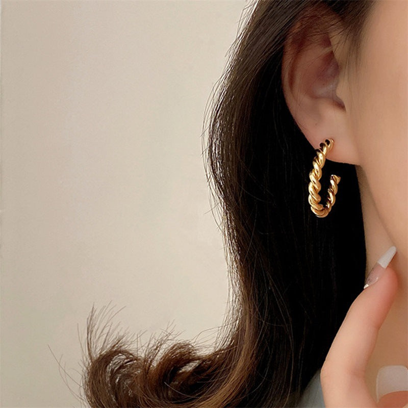 Gigi Twist Gold Earrings Image