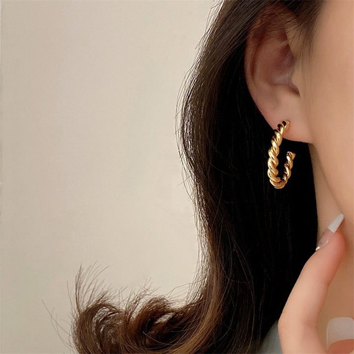 Gigi Twist Gold Earrings
