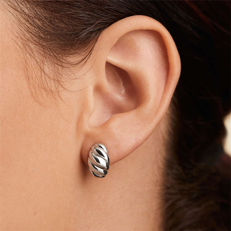 Croissant Huggie Earrings Image