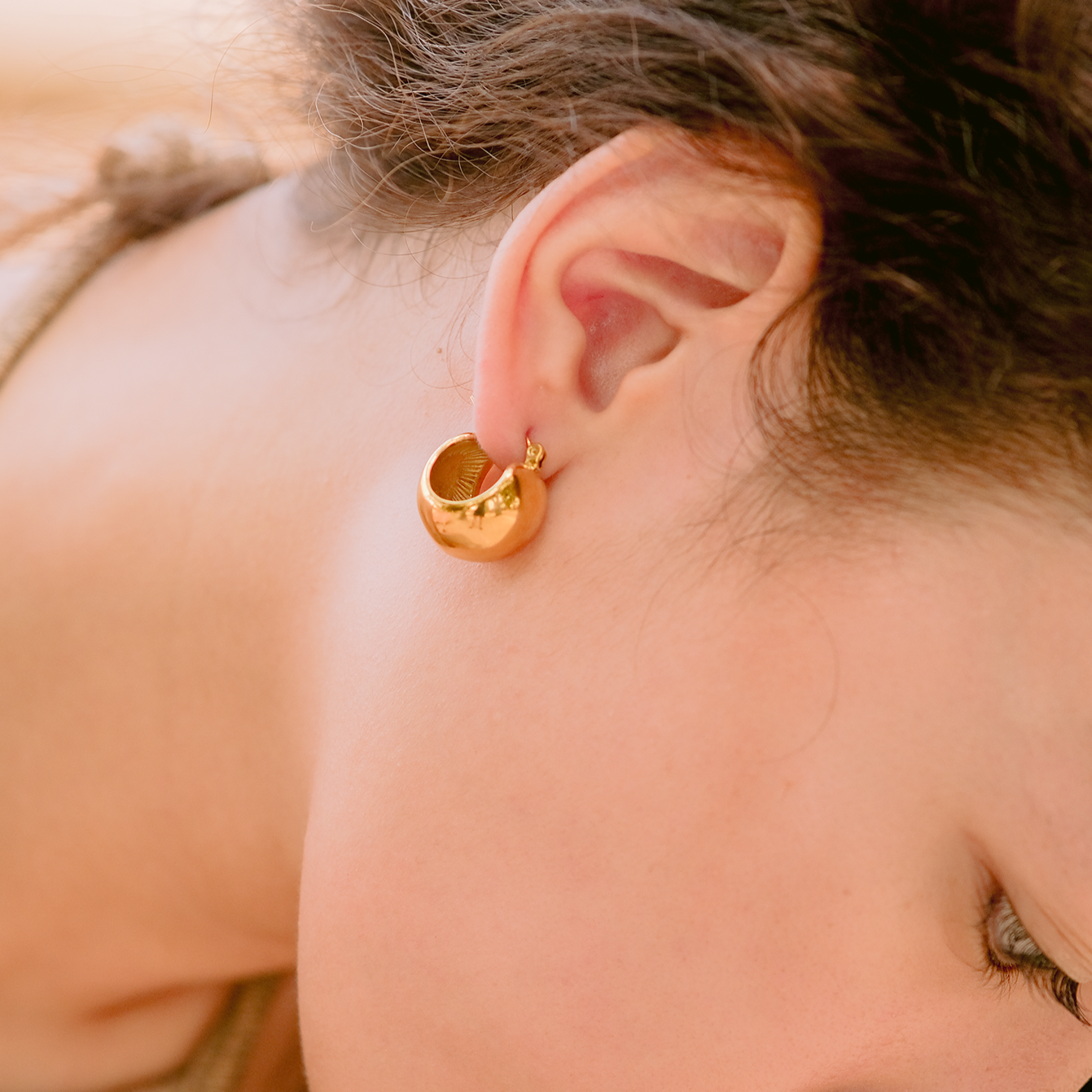 Sunna Gold Huggie Earrings Image